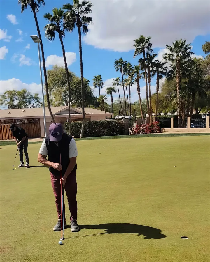 A putting drill with an alignment rod on the Dobson Ranch putting green